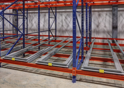 Four-deep structural pushback racking system for Chapmans Ice Cream, installed in a -40°C freezer.